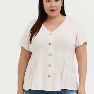 Torrid pink peplum style blouse .  Size 1x